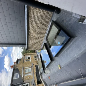 Flat-roof aluminium skylight on London house extension