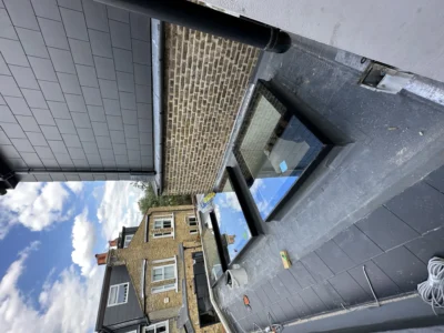 Flat-roof aluminium skylight on London house extension