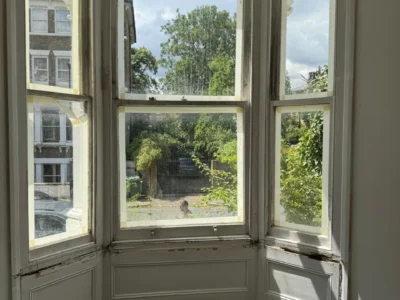 Timber sash bay window in London period property