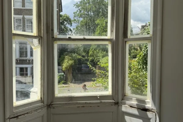Timber sash bay window in London period property