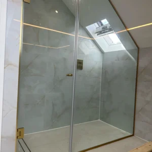 Bespoke frameless glass shower screen London loft bathroom