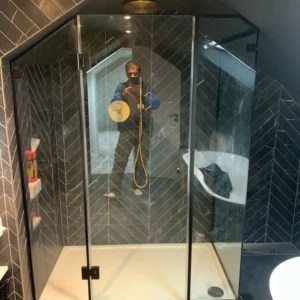 Black-framed corner glass shower enclosure London bathroom