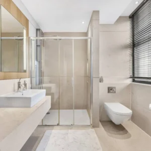 Sliding glass shower screen with mirror, London bathroom