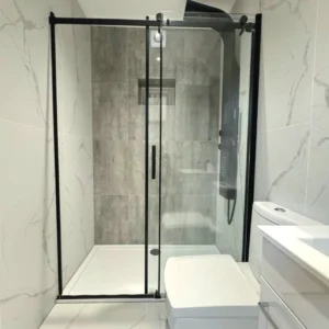 Black framed sliding shower enclosure, London bathroom