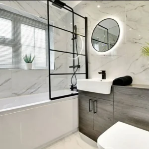 Black framed glass bath screen with mirror, London