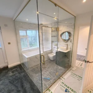 Frameless glass shower enclosure with door, London