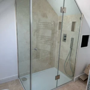 Frameless glass shower enclosure with hinged door, London