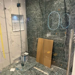 Frameless glass shower screen, London bathroom installation