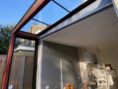Frameless structural glazing gable on London garden extension