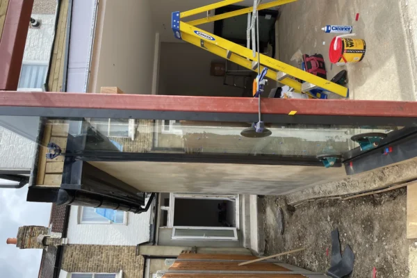 Frameless structural glass canopy on London rear extension