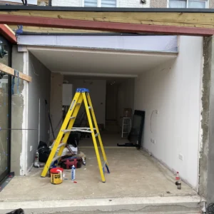 Frameless glass corner wall on London garden extension