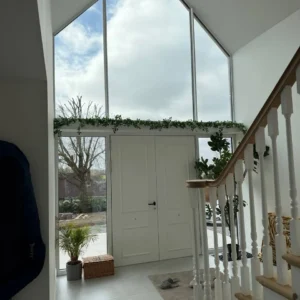 Full-height apex structural glazing at entrance, London