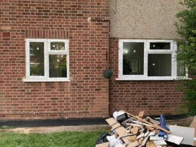 White uPVC windows on London brick house